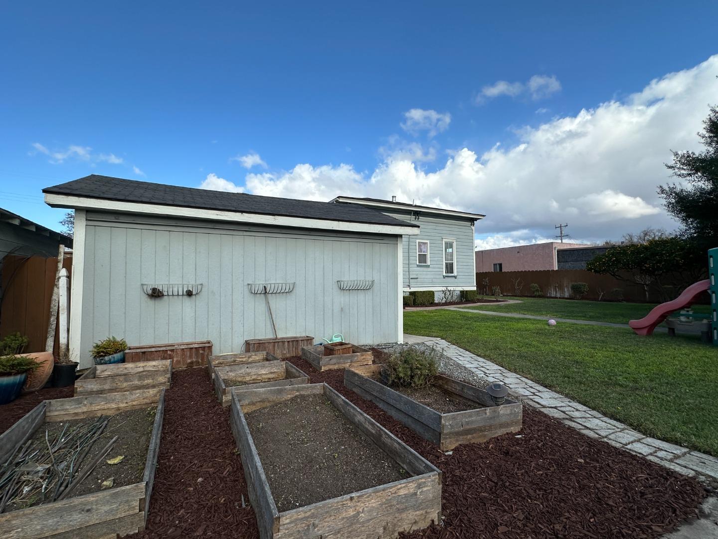 69 Geil Street Salinas, CA 93901 - Photo 29 of 34 a front view of a house with garden