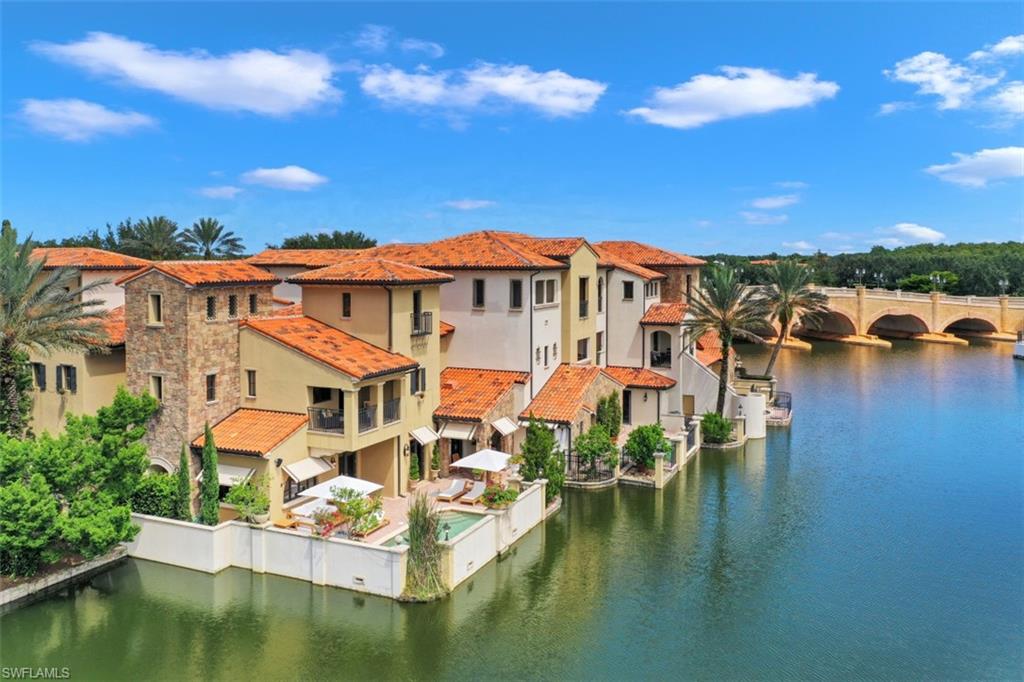 a view of a lake with building in front of it