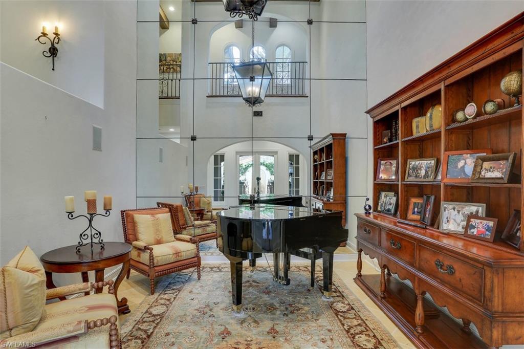 16649 Toscana Circle, Unit 806 Naples, FL 34110 - Photo 15 of 35 a living room with furniture