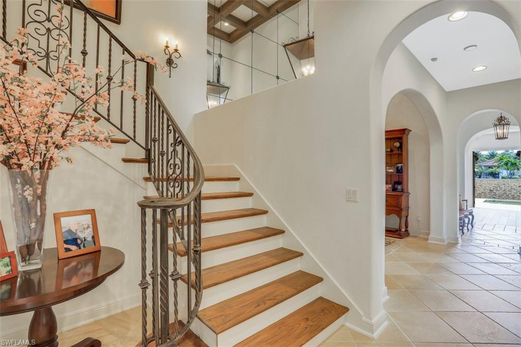 16649 Toscana Circle, Unit 806 Naples, FL 34110 - Photo 18 of 35 a view of entryway and hall with wooden floor