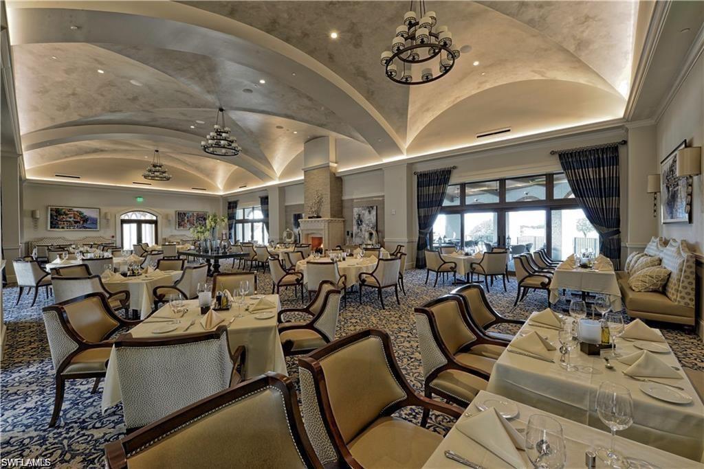 16649 Toscana Circle, Unit 806 Naples, FL 34110 - Photo 34 of 35 a view of a room with gym equipment