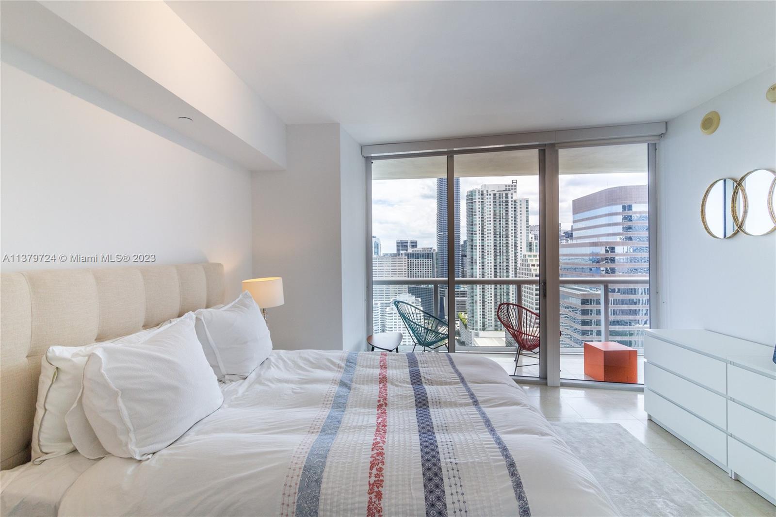 495 Brickell Avenue, Unit 3603 Miami, FL 33131 - Photo 3 of 48 a living room with furniture and a large window