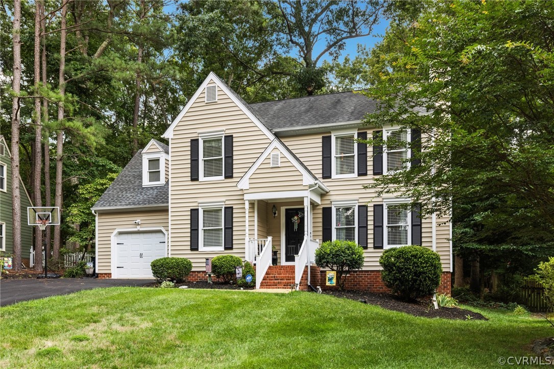 front view of a house and a yard