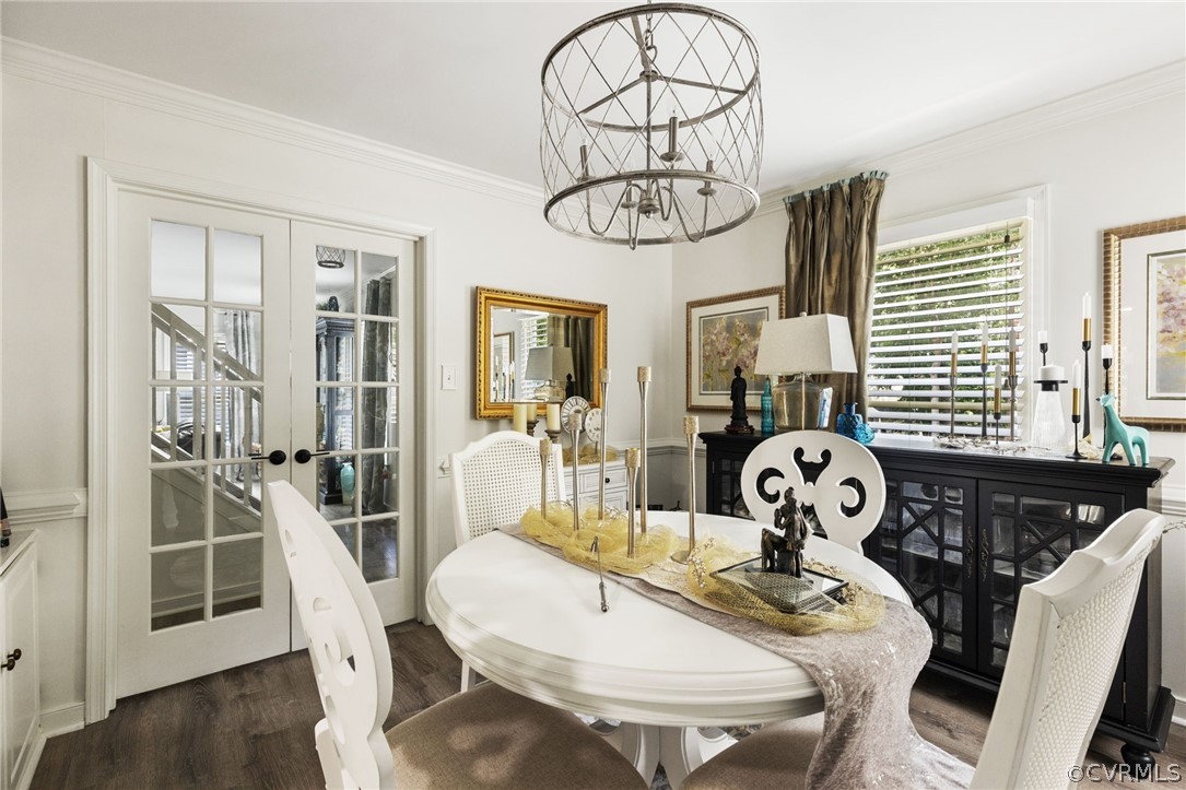 5603 Standing Oak Road Midlothian, VA 23112 - Photo 11 of 39 a view of a dining room with furniture wooden floor and chandelier