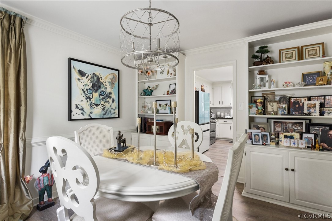 5603 Standing Oak Road Midlothian, VA 23112 - Photo 12 of 39 a view of a dining room with furniture