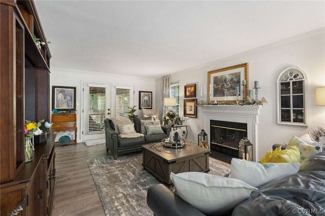 5603 Standing Oak Road Midlothian, VA 23112 - Photo 3 of 39 a living room with furniture and a fireplace