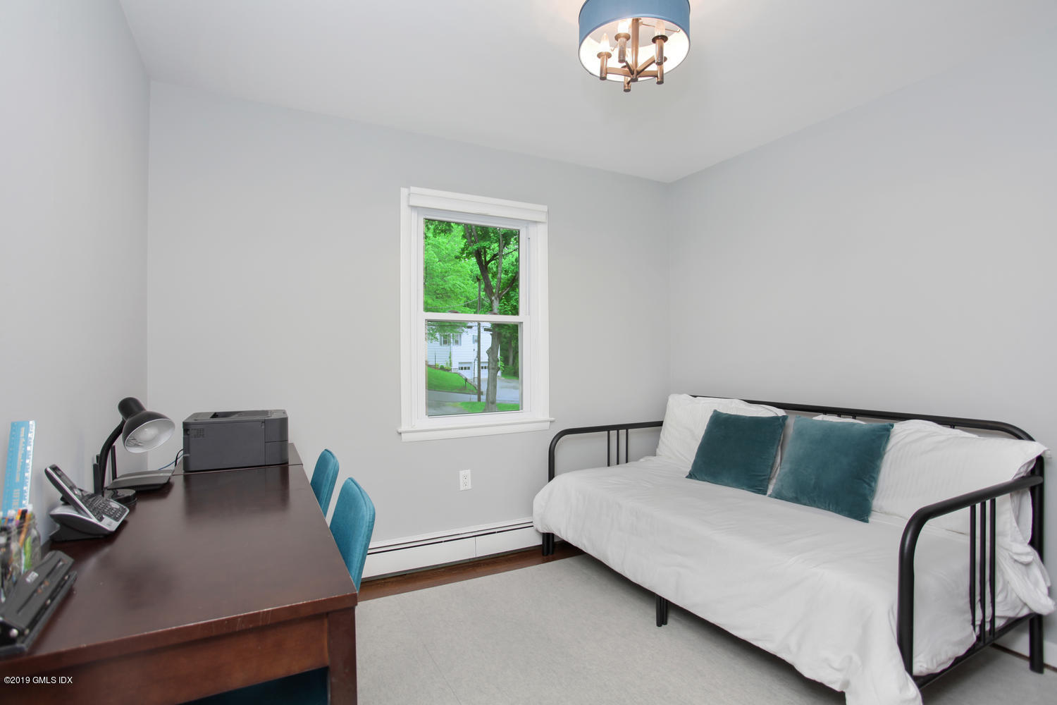 34 Dandy Drive Cos Cob, CT 06807 - Photo 12 of 20 a bedroom with a bed and a desk