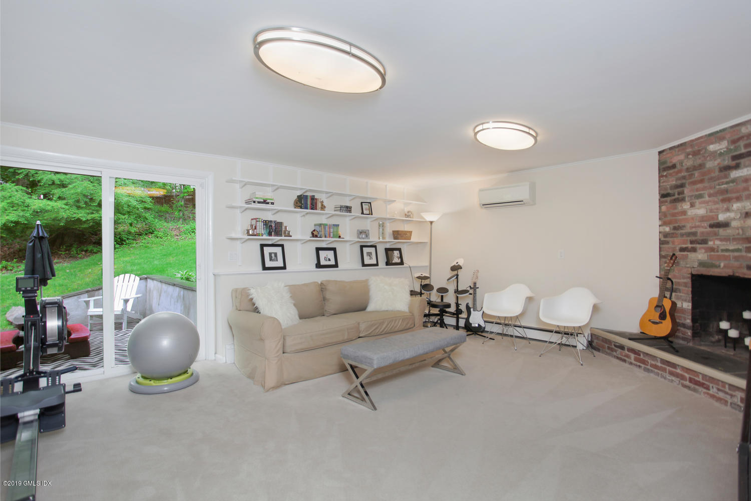 34 Dandy Drive Cos Cob, CT 06807 - Photo 13 of 20 a living room with furniture and a fireplace