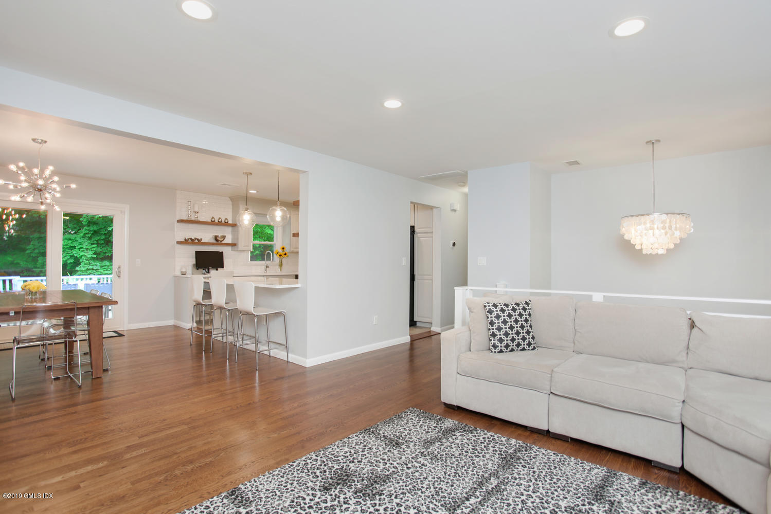 34 Dandy Drive Cos Cob, CT 06807 - Photo 6 of 20 a living room with furniture and a table