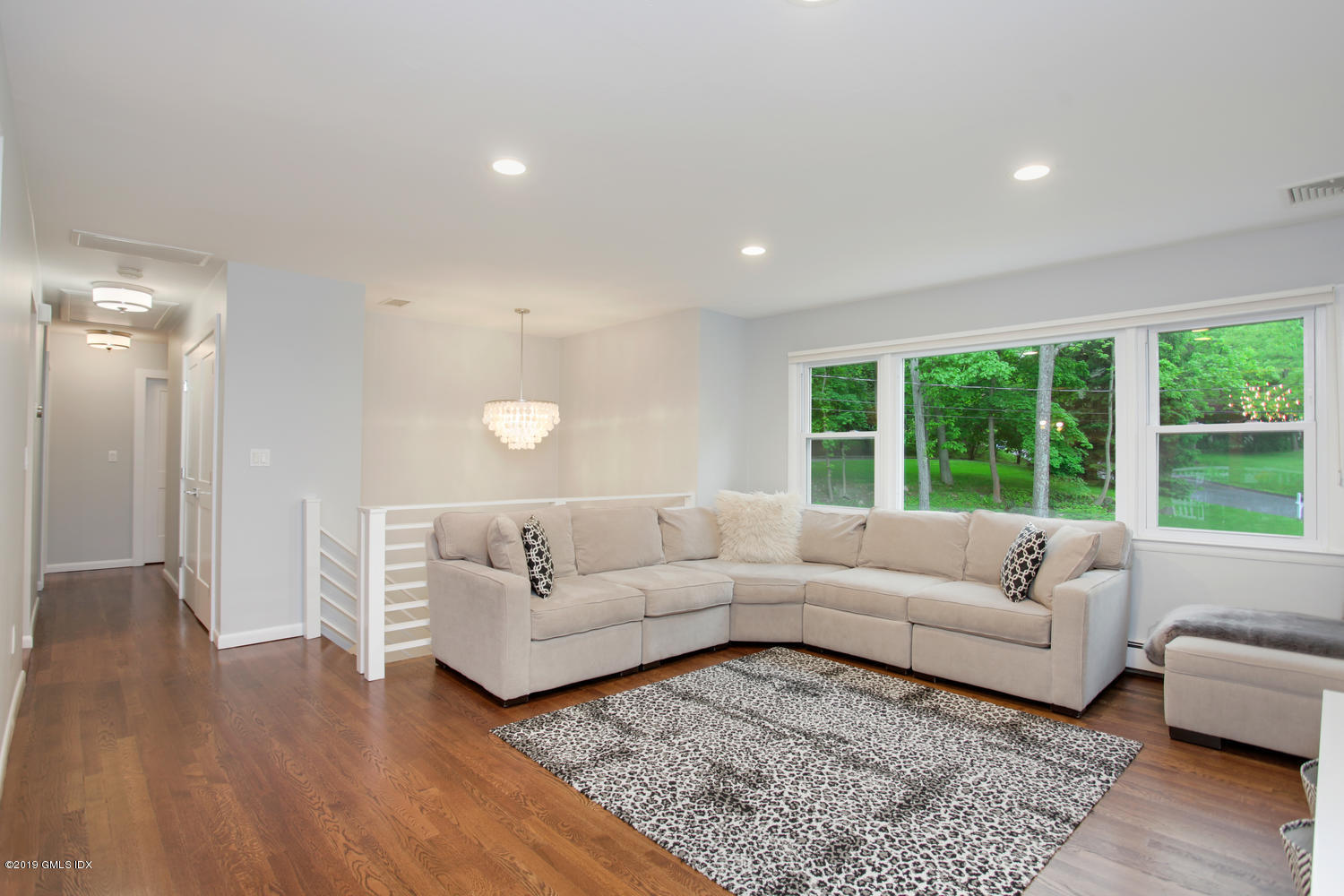 34 Dandy Drive Cos Cob, CT 06807 - Photo 8 of 20 a living room with furniture and a large window