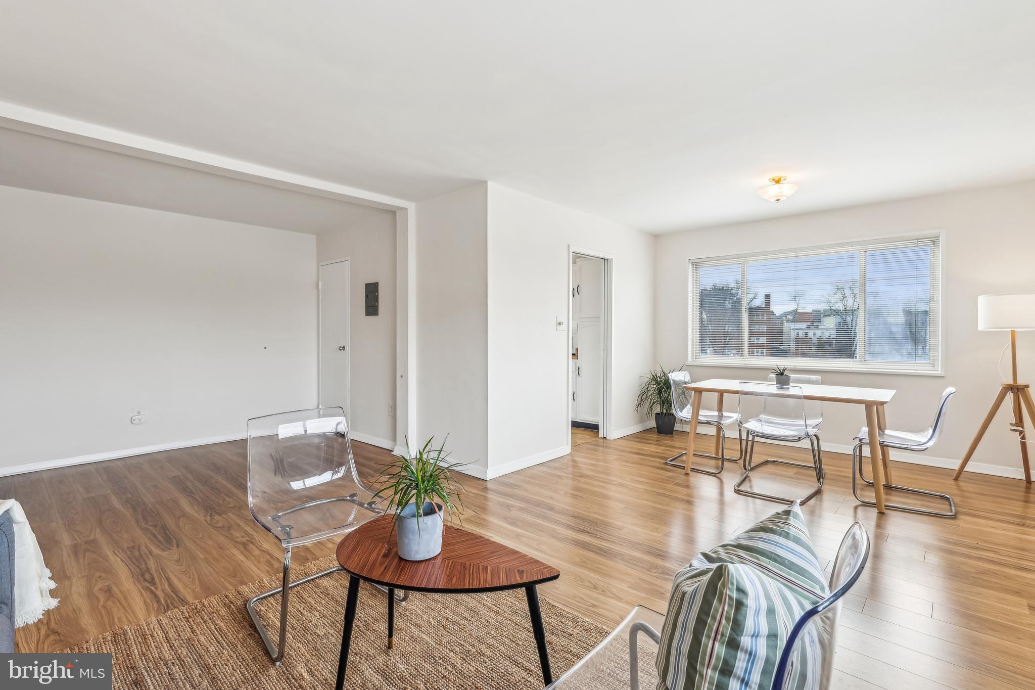 3900 Tunlaw Road Northwest, Unit 619 Washington, DC 20007 - Photo 41 of 41 Open floor plan from living room to dining area
