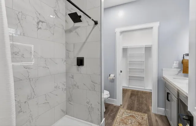 a bathroom with a sink and mirror