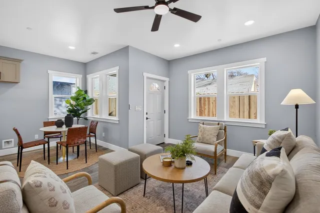 a living room with furniture and a window