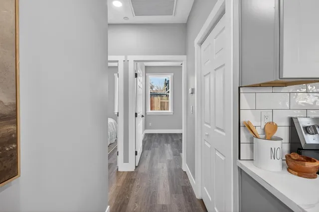 a view of a bathroom from a hallway