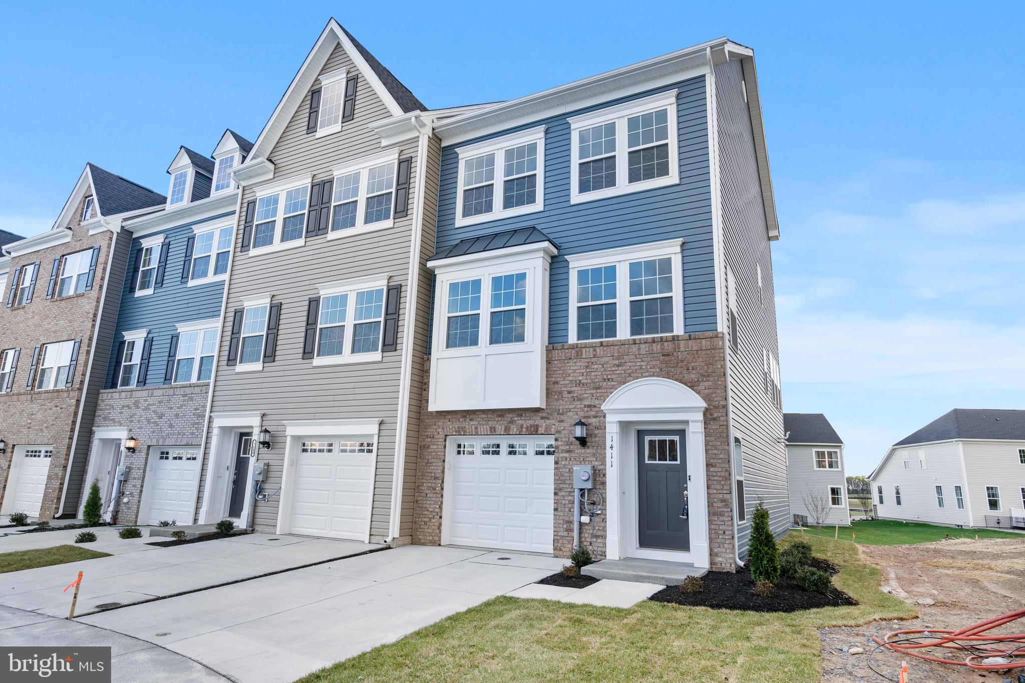 1425 Clingmans Dome Drive Frederick, MD 21702 - Photo 2 of 46 a front view of a house with a yard