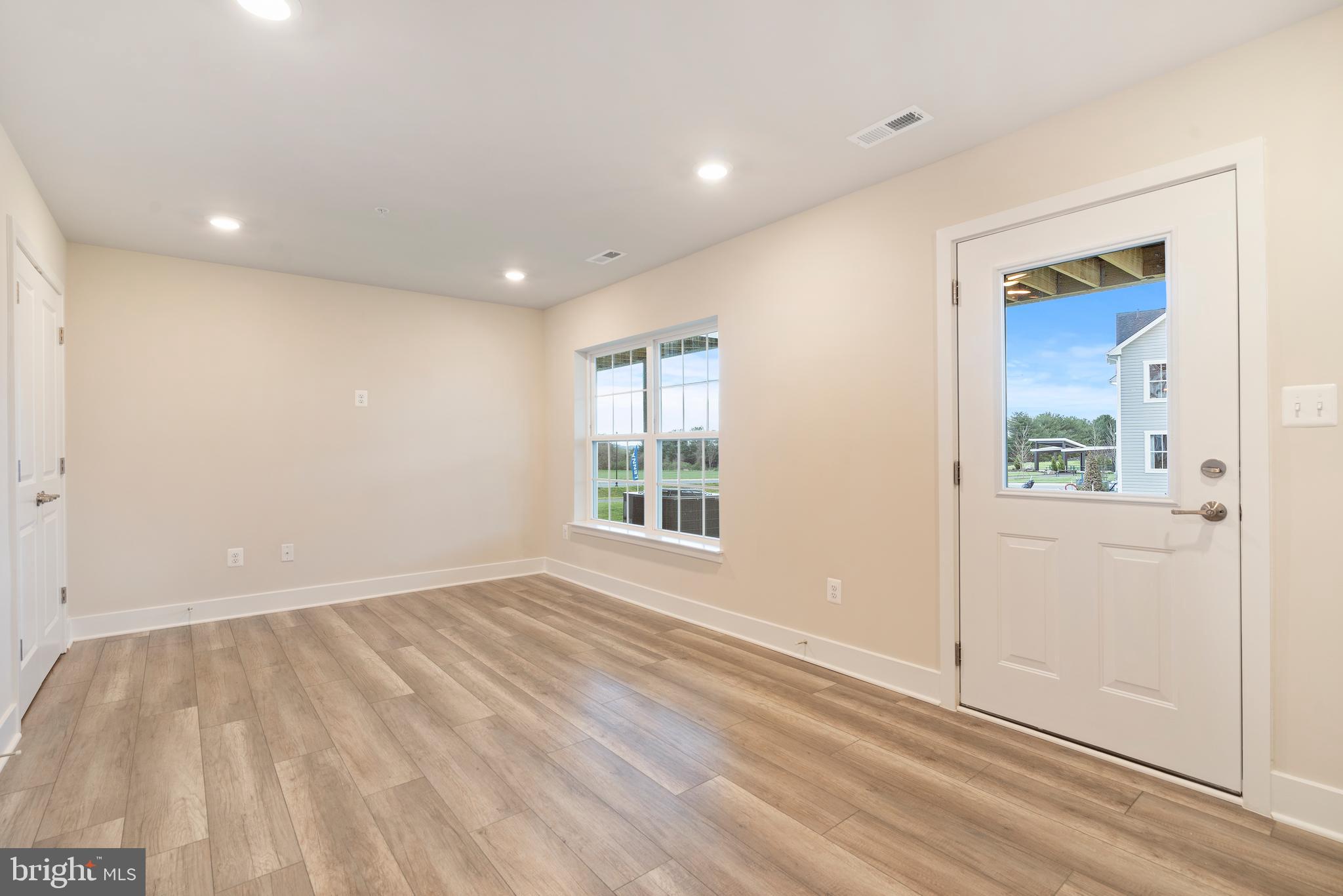 1425 Clingmans Dome Drive Frederick, MD 21702 - Photo 34 of 46 a view of wooden floor and windows in a room