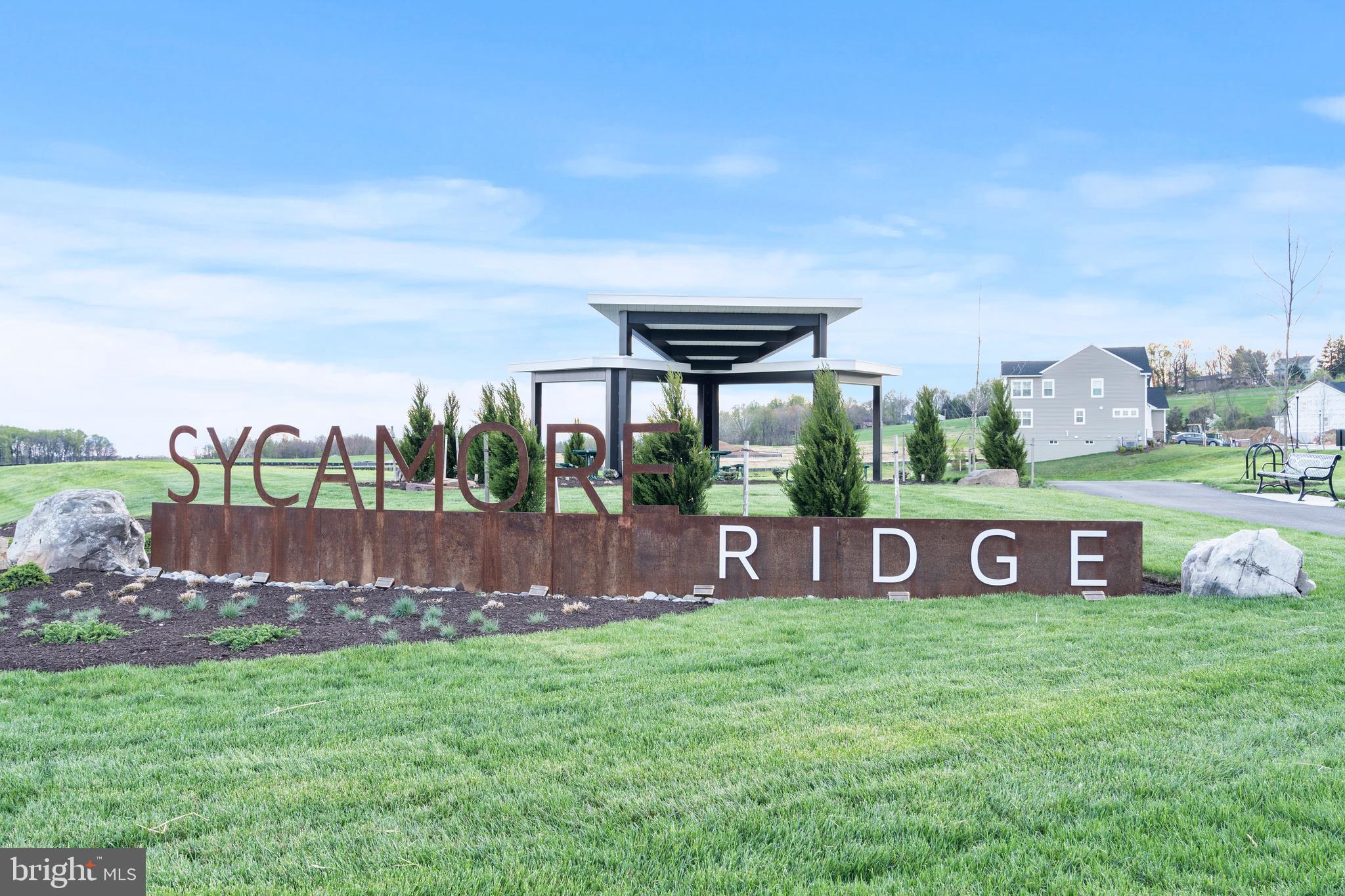 1425 Clingmans Dome Drive Frederick, MD 21702 - Photo 45 of 46 a front view of a house with garden and street view