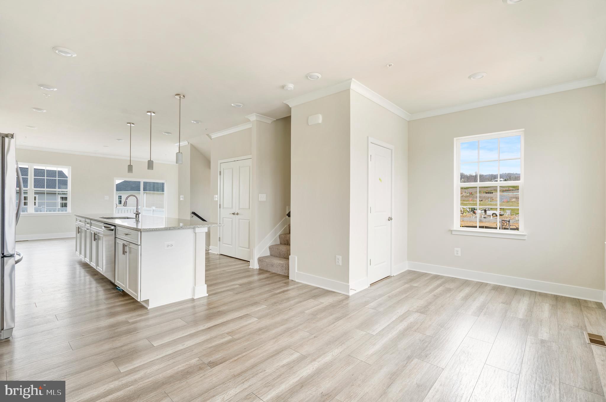 1425 Clingmans Dome Drive Frederick, MD 21702 - Photo 9 of 46 a view of kitchen with wooden floor and window