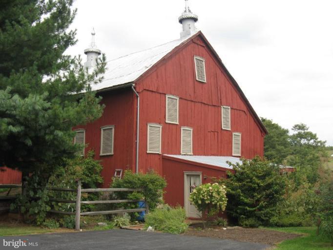 11625 Walnut Point Road Hagerstown, MD 21740 - Photo 3 of 25 a view of a house with a yard