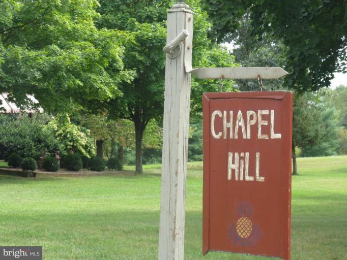 11625 Walnut Point Road Hagerstown, MD 21740 - Photo 6 of 25 a sign that is on the side of a building