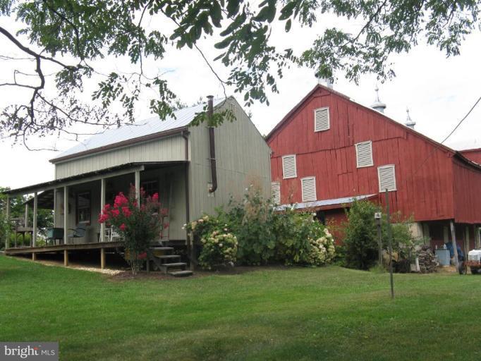 11625 Walnut Point Road Hagerstown, MD 21740 - Photo 7 of 25 a view of a two chairs in a yard