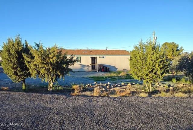 a view of a yard with an outdoor space