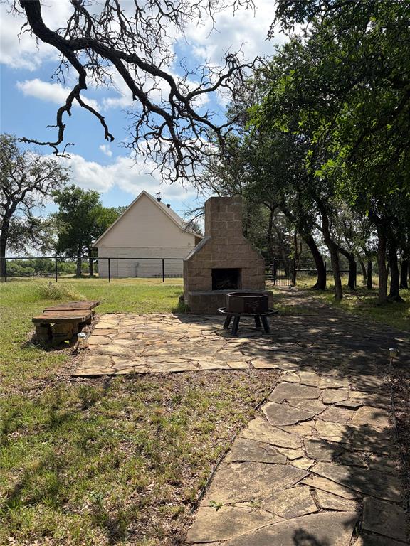 166 East Rio Ridge Azle, TX 76020 - Photo 39 of 40 a view of a house with a yard