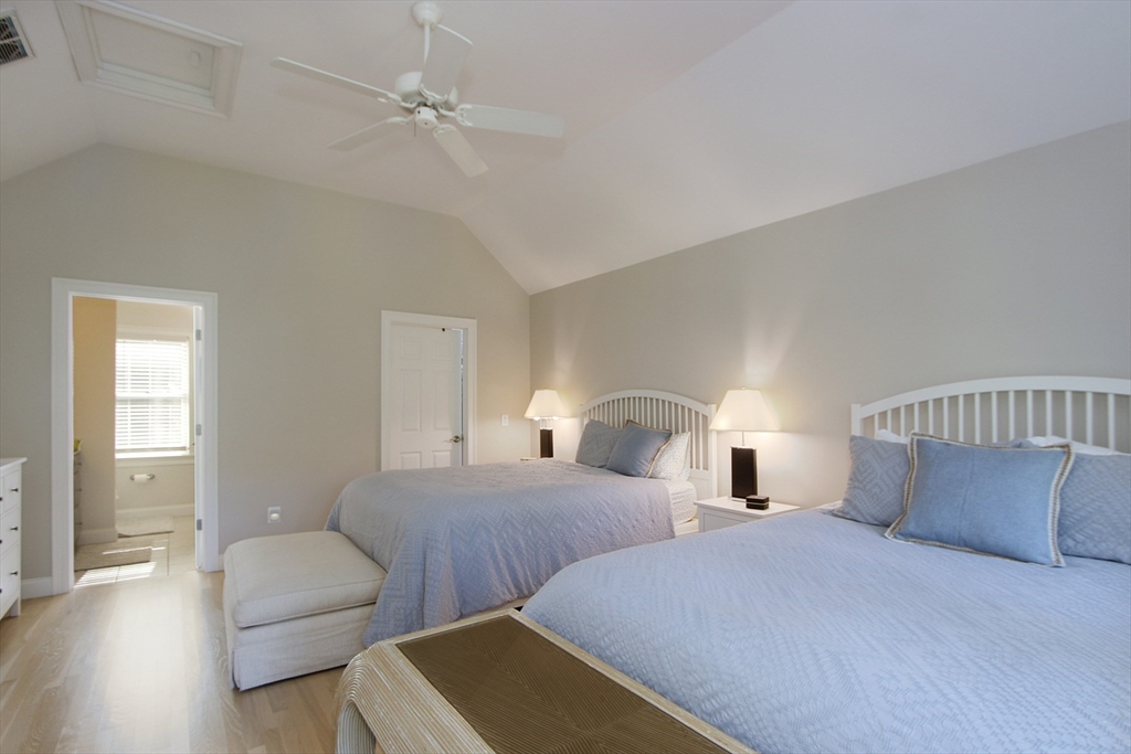42 Fells Pond Road Mashpee, MA 02649 - Photo 17 of 35 a bedroom with two beds and a couch