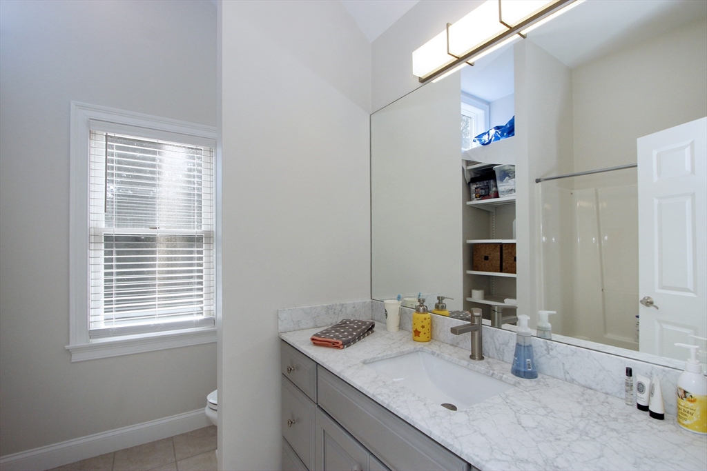 42 Fells Pond Road Mashpee, MA 02649 - Photo 20 of 35 a view of storage and utility room with washer and dryer