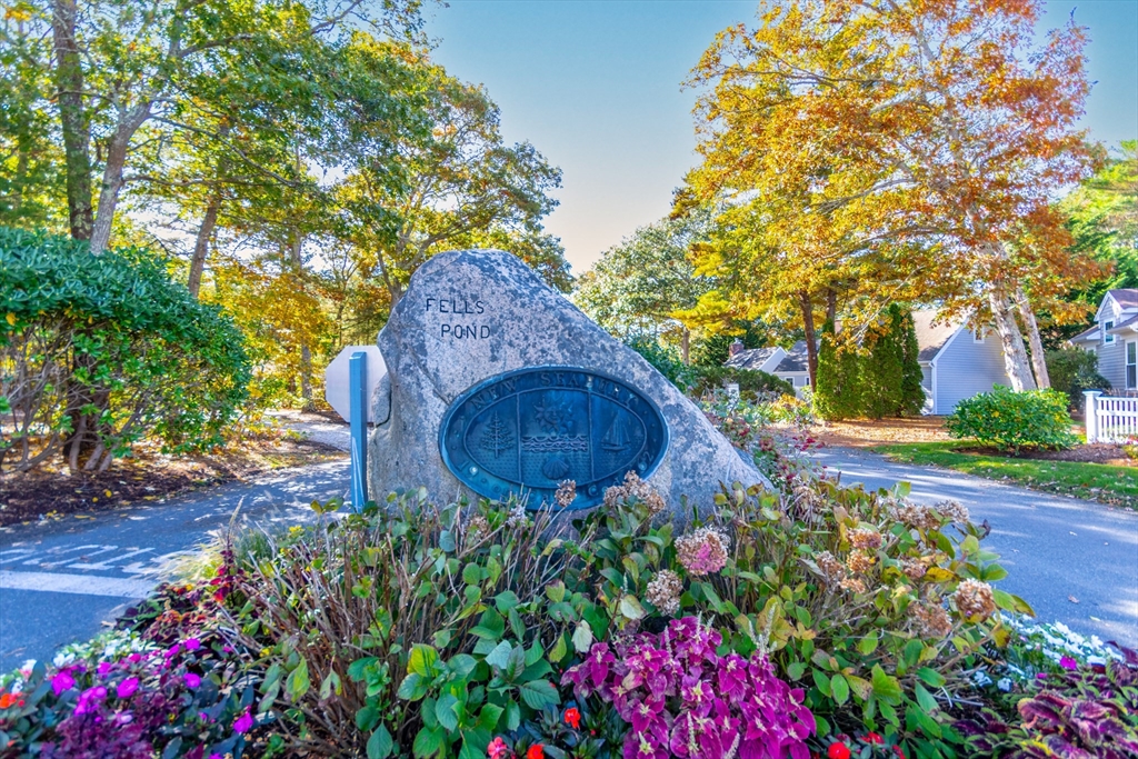 42 Fells Pond Road Mashpee, MA 02649 - Photo 23 of 35 a garden view with a fountain