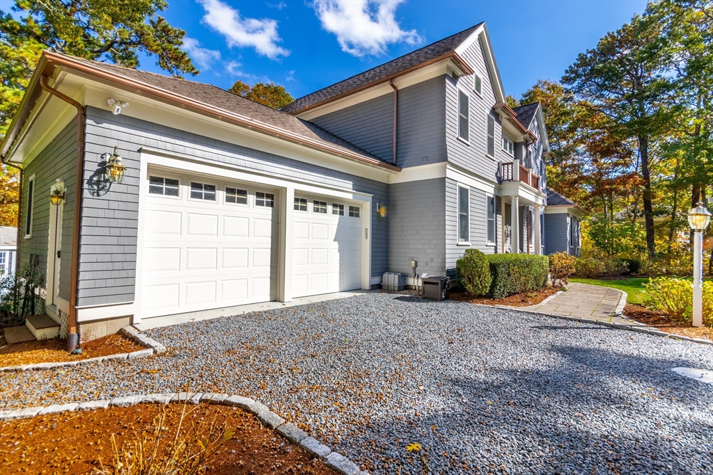 42 Fells Pond Road Mashpee, MA 02649 - Photo 27 of 35 a view of a house with a backyard