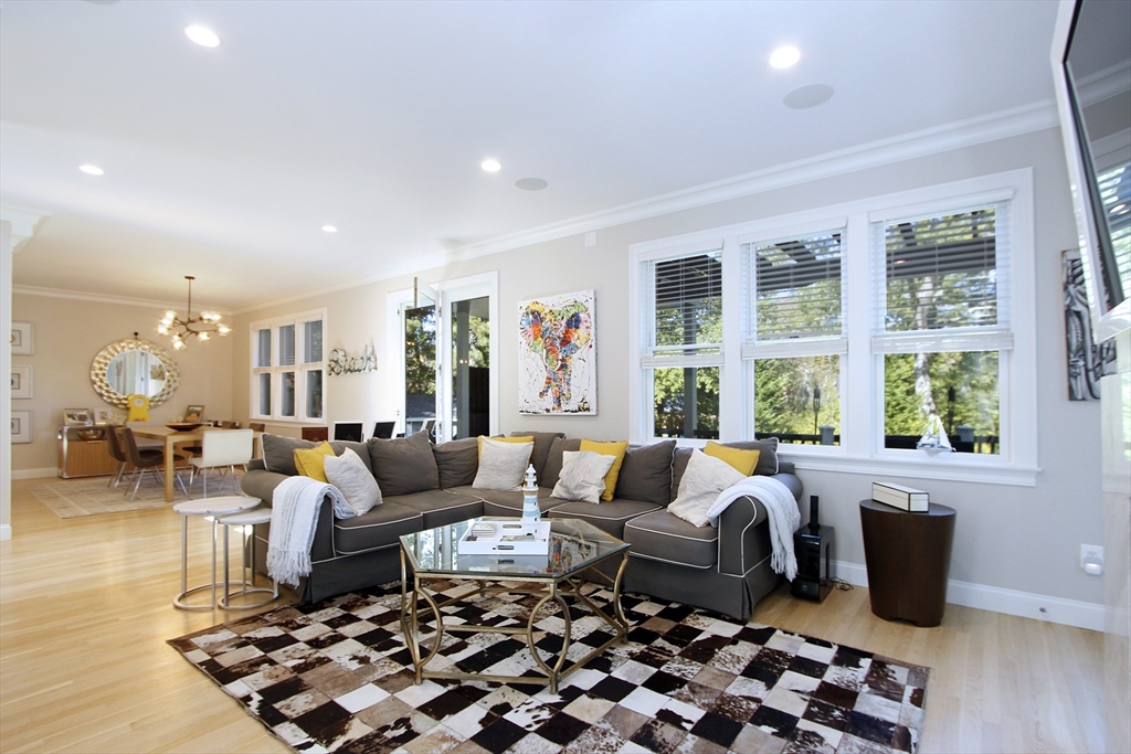 42 Fells Pond Road Mashpee, MA 02649 - Photo 7 of 35 a living room with furniture and wooden floor