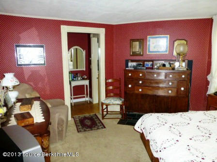 1475 Savoy Road Windsor, MA 01270 - Photo 25 of 61 a bedroom with a bed and a dresser