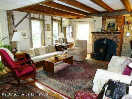 1475 Savoy Road Windsor, MA 01270 - Photo 48 of 61 a living room with furniture windows and a fireplace