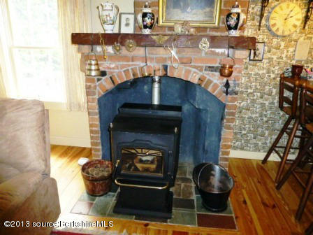 1475 Savoy Road Windsor, MA 01270 - Photo 49 of 61 a living room with a fireplace