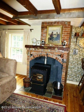 1475 Savoy Road Windsor, MA 01270 - Photo 53 of 61 a living room with furniture and a fireplace