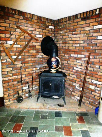 1475 Savoy Road Windsor, MA 01270 - Photo 60 of 61 a stove top oven sitting inside of a kitchen