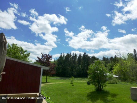 1475 Savoy Road Windsor, MA 01270 - Photo 7 of 61 a backyard of a house with lots of green space