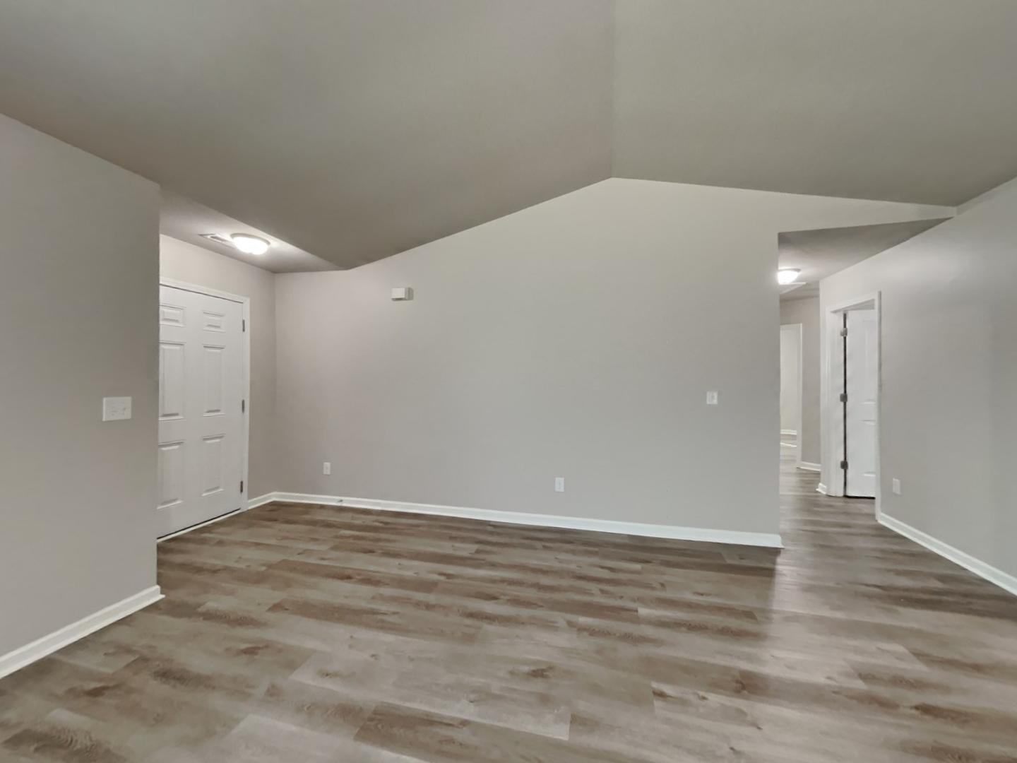169 Willow Ridge Circle Willow Spring, NC 27592 - Photo 2 of 17 a view of an empty room