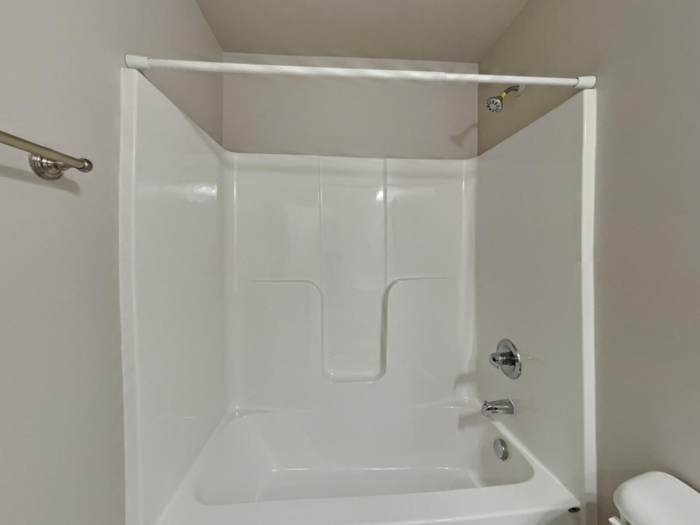 169 Willow Ridge Circle Willow Spring, NC 27592 - Photo 10 of 17 a close view of a bathtub in bathroom