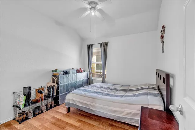 a bathroom with a double vanity sink mirror and toilet