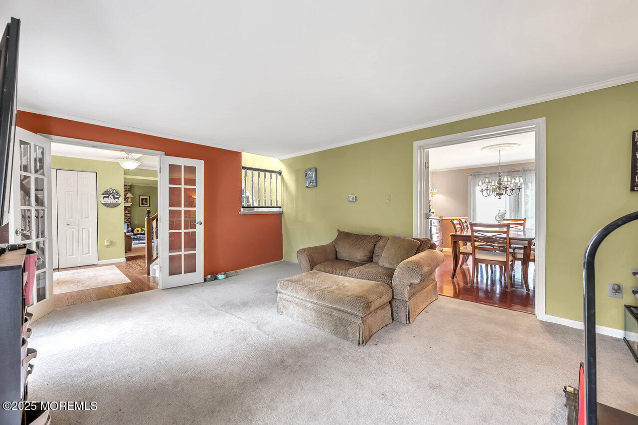 4 Cranberry Court Cream Ridge, NJ 08514 - Photo 19 of 51 a living room with furniture and a window