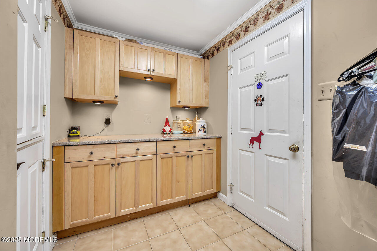 4 Cranberry Court Cream Ridge, NJ 08514 - Photo 21 of 51 a kitchen with white cabinets and refrigerator