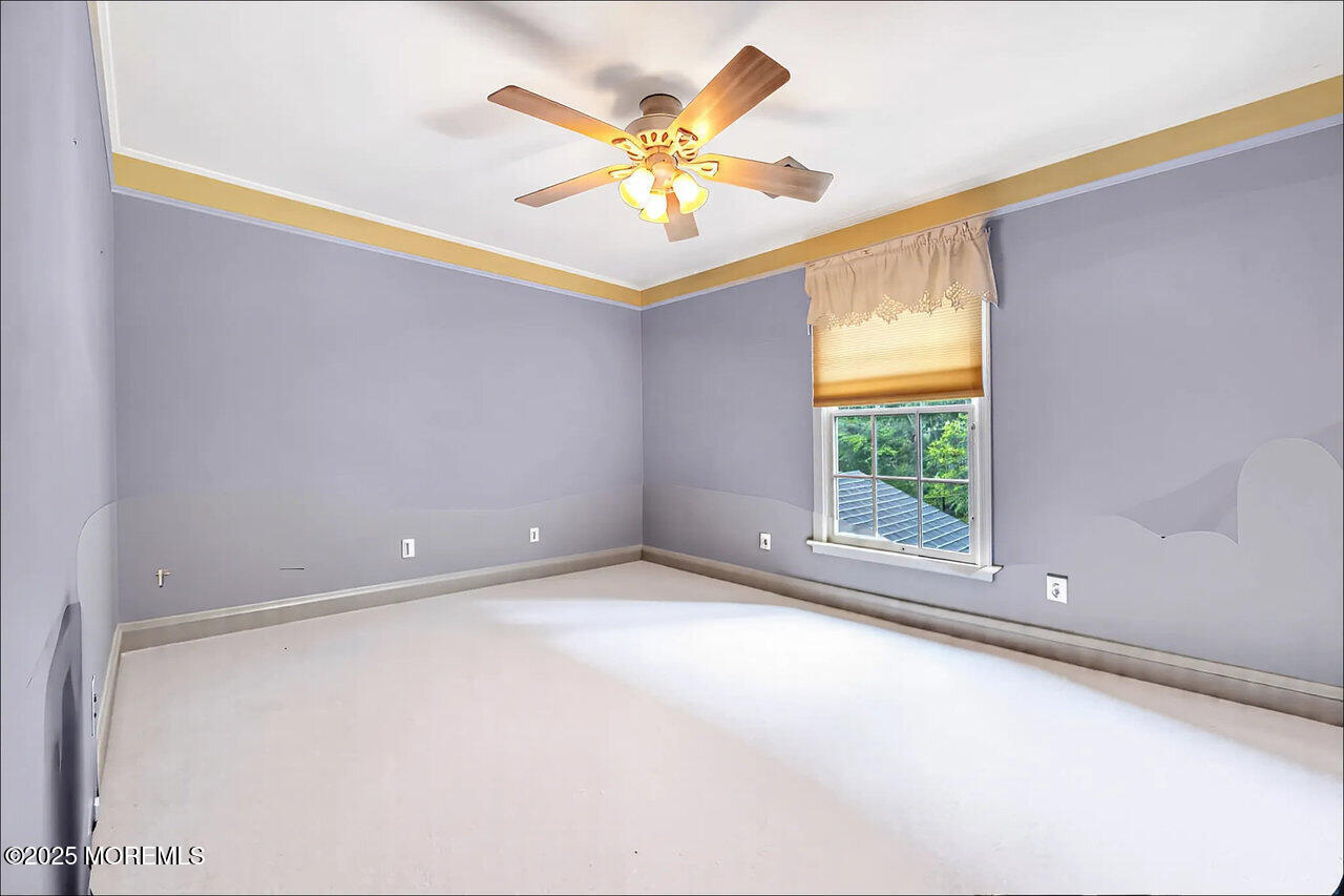 4 Cranberry Court Cream Ridge, NJ 08514 - Photo 30 of 51 a view of an empty room with a window