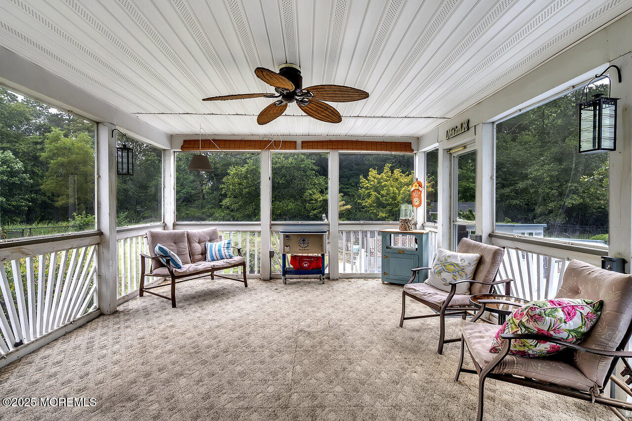 4 Cranberry Court Cream Ridge, NJ 08514 - Photo 39 of 51 a living room with furniture and a large window
