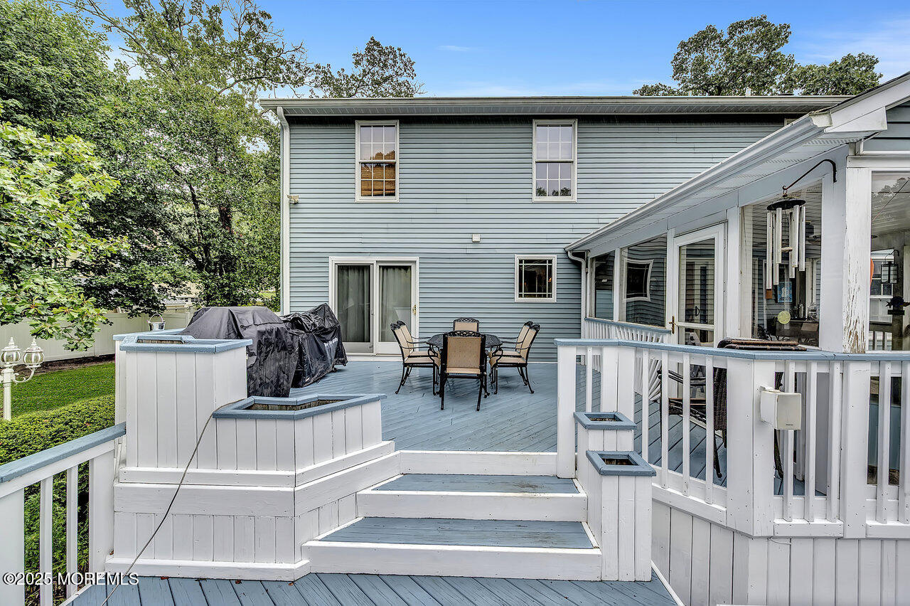 4 Cranberry Court Cream Ridge, NJ 08514 - Photo 42 of 51 a view of a patio with couches table and chairs and potted plants