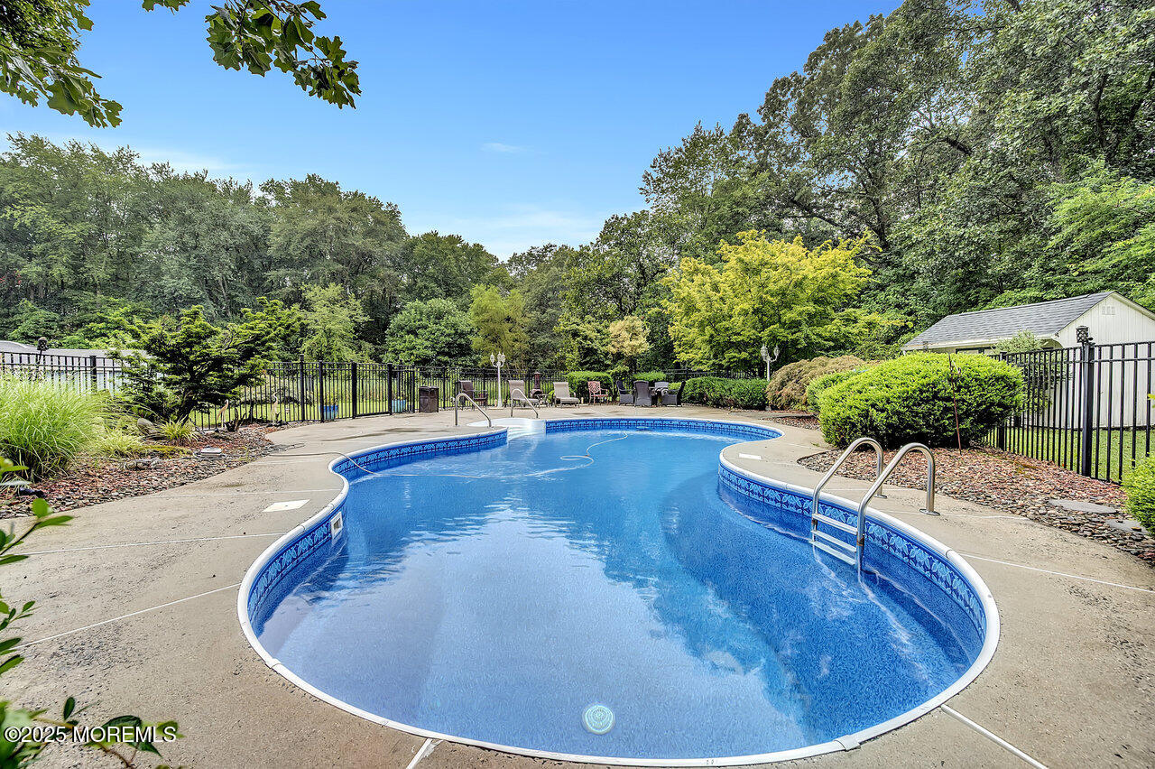 4 Cranberry Court Cream Ridge, NJ 08514 - Photo 43 of 51 a view of a swimming pool with an outdoor space