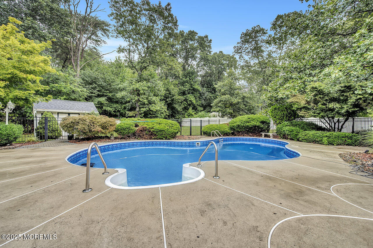 4 Cranberry Court Cream Ridge, NJ 08514 - Photo 44 of 51 a view of a swimming pool with a yard