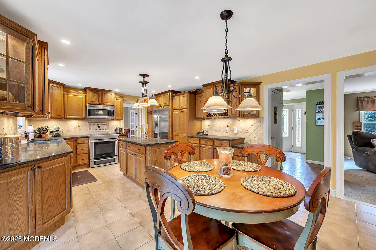 4 Cranberry Court Cream Ridge, NJ 08514 - Photo 6 of 51 a view of a dining room with furniture