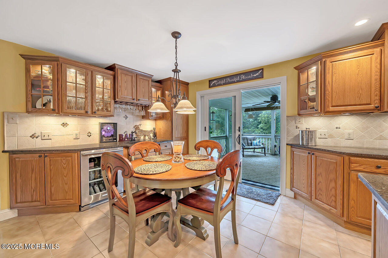 4 Cranberry Court Cream Ridge, NJ 08514 - Photo 7 of 51 a dining room with a granite top table and chairs